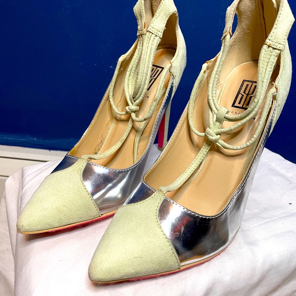 mint green heel with red bottom